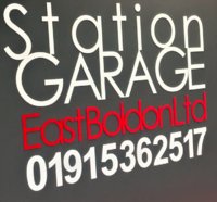 Station Garage logo